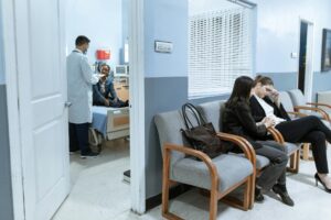 A woman sits contemplating loss from personal injury damages