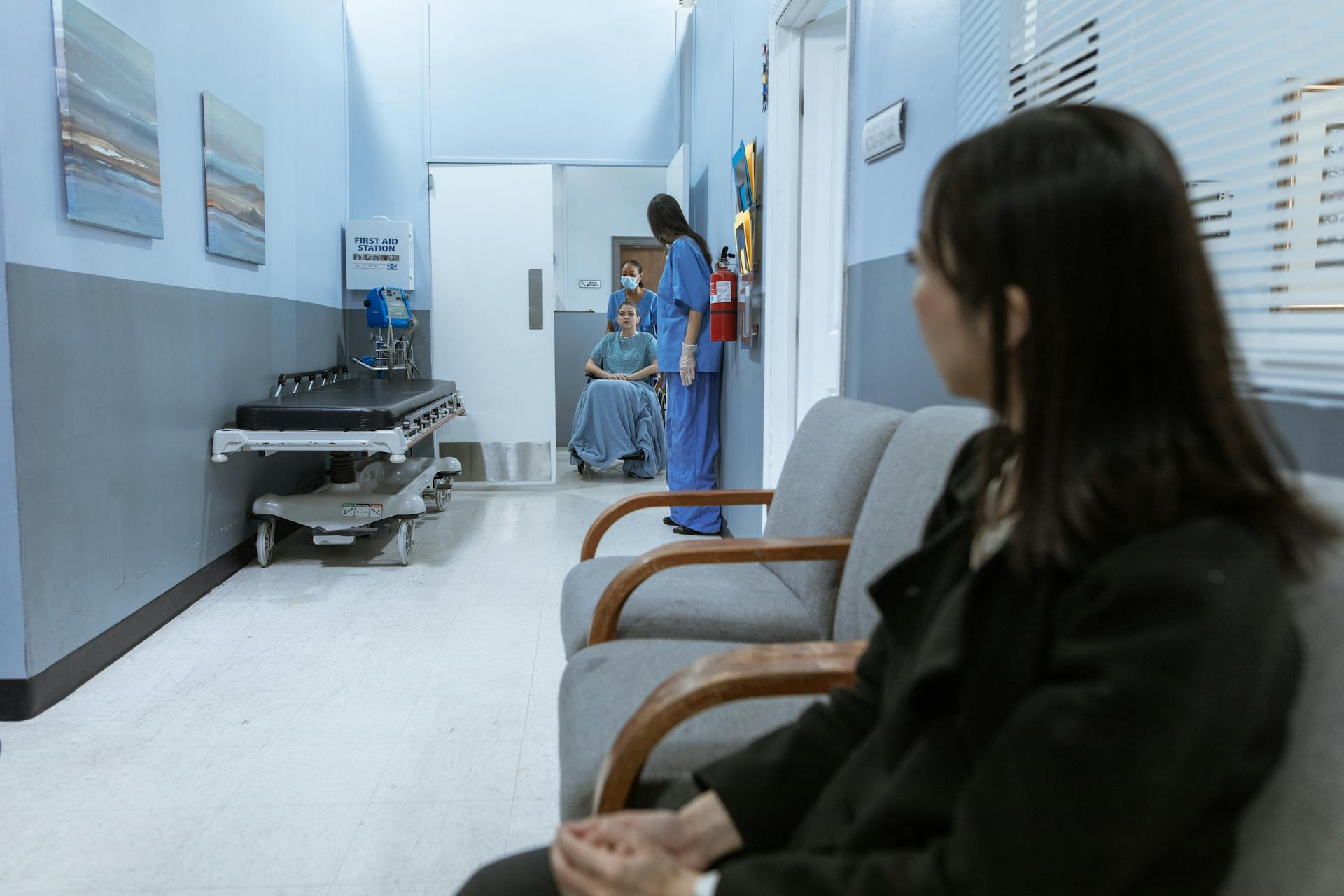 A women sits waiting to figure out what damages she will incur